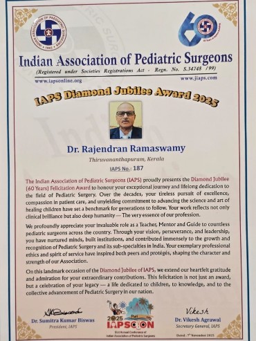 Dr. Rajendran receiving award